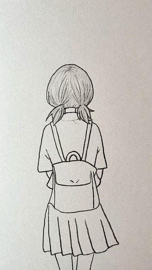 背着书包的女孩的背影