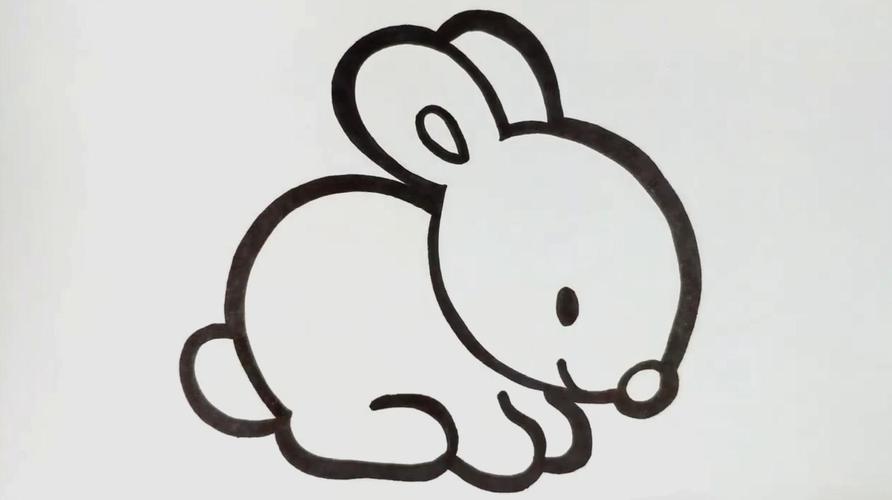 1可爱的小兔子简笔画:先画兔子的两只耳朵,再画脑袋和身体的轮廓,再画